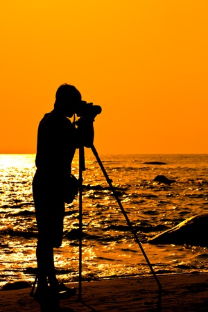 Silhouette Photographer on the beach, Thailandの写真素材