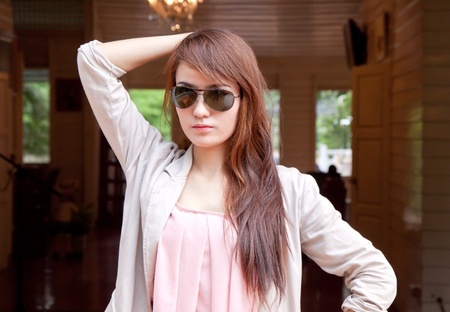 Asian woman with sun glasses of out doorの写真素材