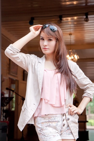 Asian woman with sun glasses of out doorの写真素材