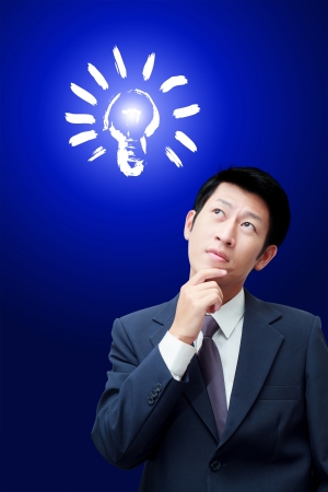 Thinking businessman with red icons on backgroundの写真素材