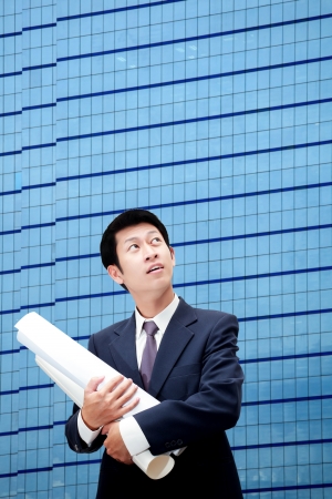 Build inspector checking a construction site worksの写真素材