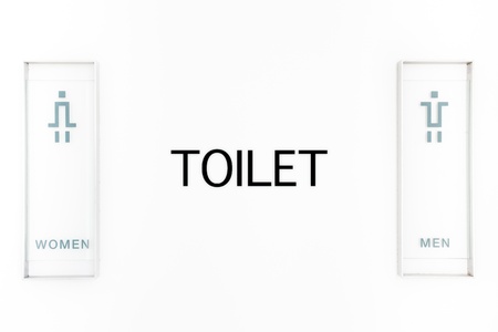 Toilet signs on white wall, signs backgroundの写真素材