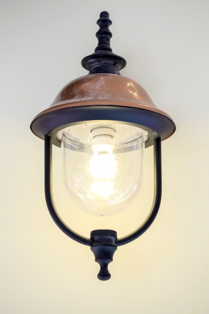vintage wall lamp on the wall backgroundの写真素材