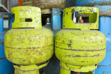 Domestic propane gas bottles ready to be refilled and recycledの写真素材