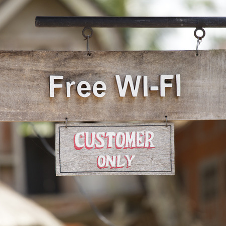 Free wifi symbol signs on the old woodの写真素材