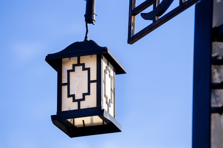 Wood ceiling lamp with chinese style on blue skyの写真素材