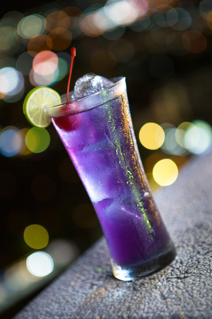 Purple cocktail in a glasses at night lifeの写真素材