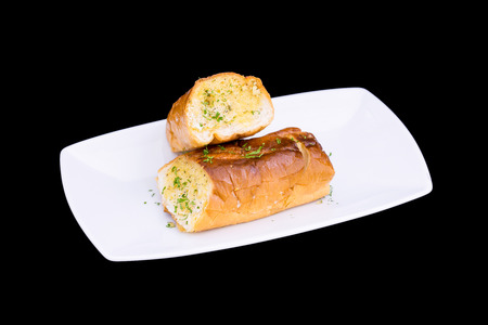 fresh Garlic breads on white plateの写真素材