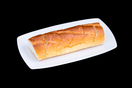 Bread on white plateの写真素材