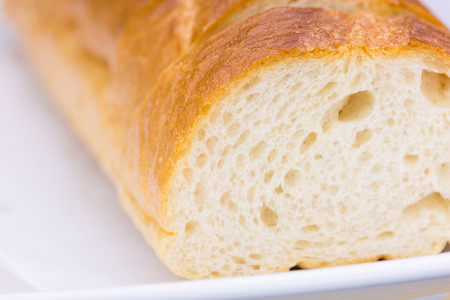 Bread on white plateの写真素材