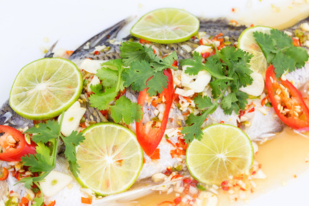 steamed fish, Chinese style steamed fish in spicy sauceの写真素材