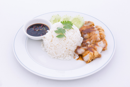Chinese roasted pork served with soy sauce. Fresh cooked with hot steam riceの写真素材