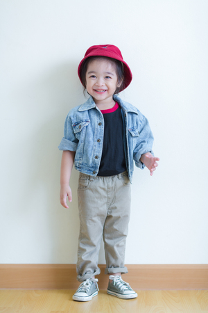 Kids in action of her houseの写真素材