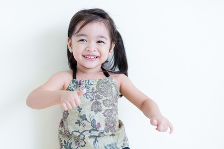 Kids in action of her houseの写真素材