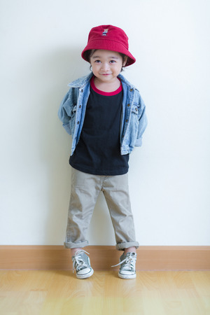 Kids in action of her houseの写真素材