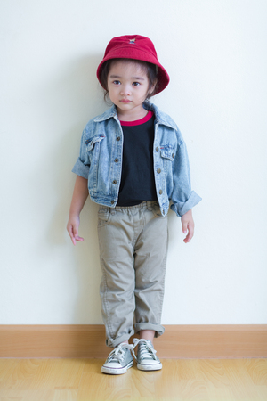 Kids in action of her houseの写真素材