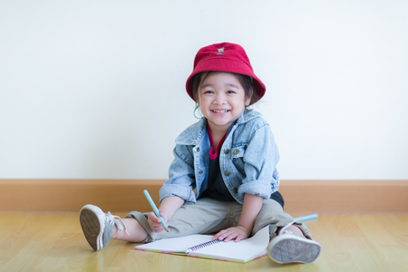 Kids in action of her houseの写真素材