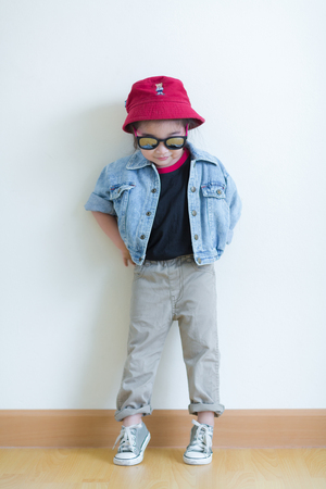 Kids in action of her houseの写真素材