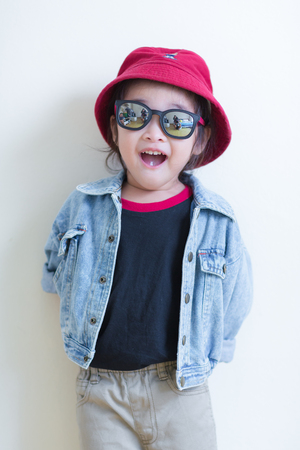 Kids in action of her houseの写真素材