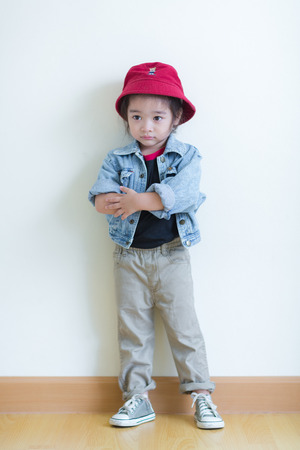 Kids in action of her houseの写真素材