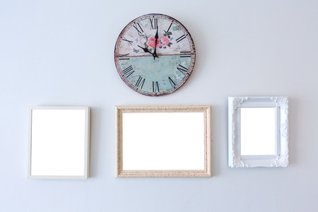 Wood picture frame on white wall backgroundの写真素材