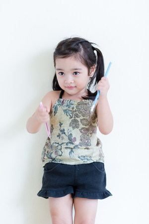 Kids in action of her houseの写真素材