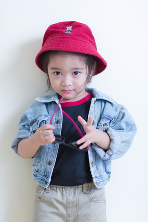 Kids in action of her houseの写真素材