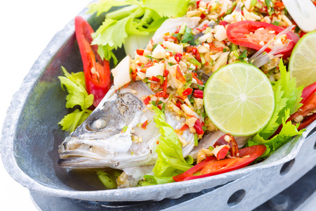 fish streamed lemon on white backgroundの写真素材