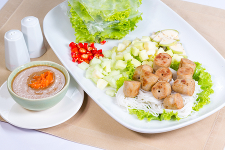 Vietnamese Meatball Wraps,Pork Sausage wraps with vegetables (Nam-Neaung)の写真素材