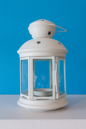 White lantern with a candleの写真素材