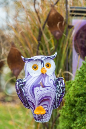 Owl made ââof colored glass in the gardenの写真素材