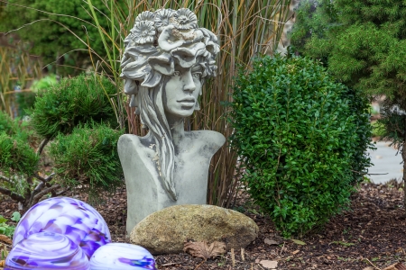 Bust, Figurine, female, garden, glass, stone, shrubs, plants, statue,の写真素材