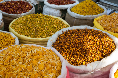 Spices and cereals in India on the marketの写真素材