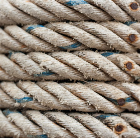 Old Nylon Rope with Nail Rust Backgroundの写真素材