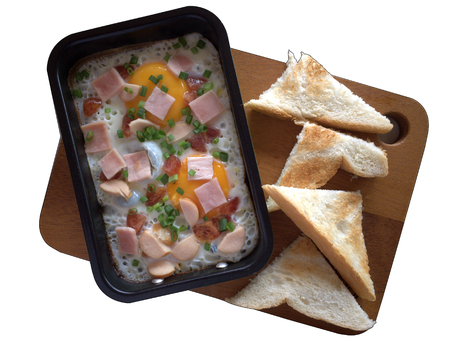 Breakfast Egg Pudding Ham Hot Bacon With a toast placed on a wooden tray, isolated clipping pathの写真素材