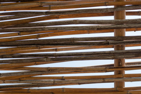 bamboo old brown plank fence texture backgroundの写真素材