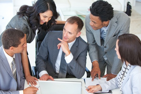 Businessteam talking about a project in officeの写真素材