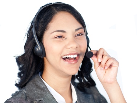 Businesswoman with a headset on talking の写真素材