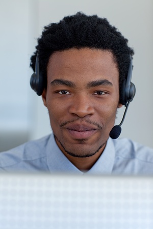 Portrait of Afro-American businessman in a call centerの写真素材