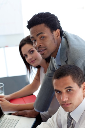 Afro-American businessman working with his teamの写真素材
