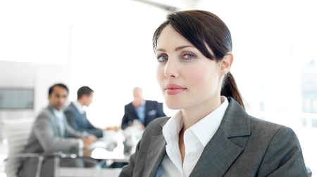 Close-up of a businesswoman in a wheelchair during a meetingの写真素材