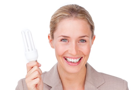 Smiling businesswoman holding a moleculeの写真素材
