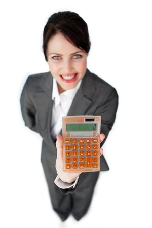 Cheerful businesswoman holding a calculator の写真素材