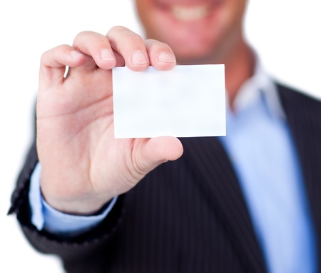 Close-up of a businessman holding a white card の写真素材