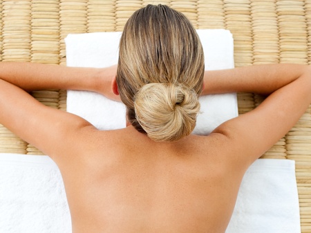 Blond woman relaxing の写真素材