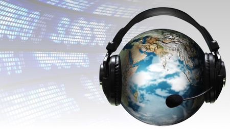 Ear Phones and ear Piece around a Globeの写真素材