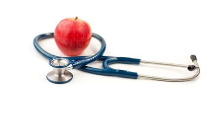 Stethoscope and an appleの写真素材