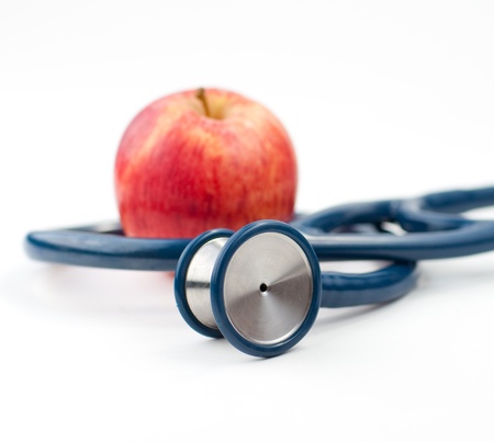 Stethoscope and an appleの写真素材