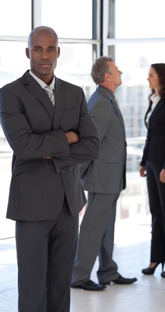 Multi-ethnic Business group looking at camera