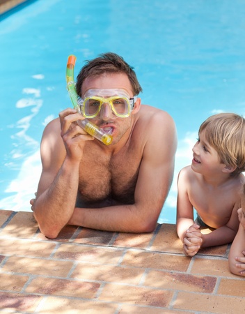 Father with his son in the swimming poolの写真素材